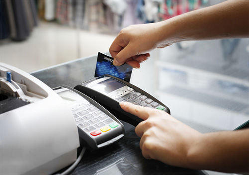 Use debit card for withdrawals and credit card for purchases