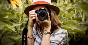 woman-holding-dslr-camera