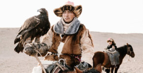asian-man-on-horse-with-falcon-on-his-hand
